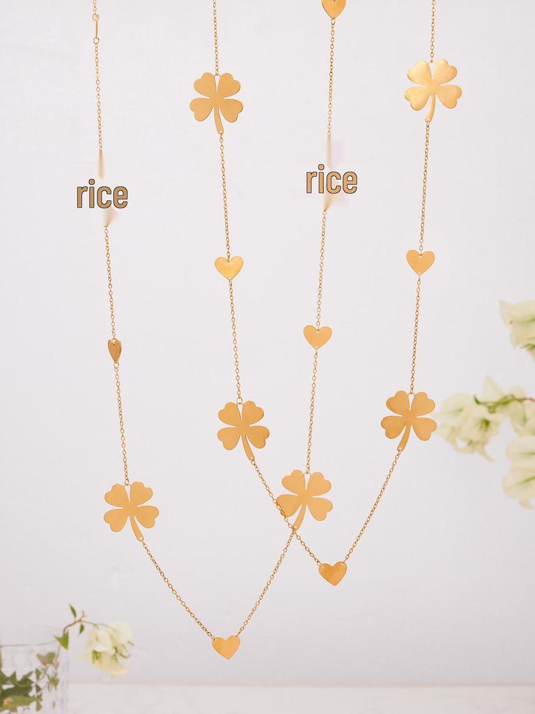 Oumeka 18k Gold-Plated Stainless Steel Jewelry Set: Heart & Four-Leaf Clover Earrings, Ring, and Necklace.