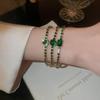 Elegant Diamond-Set Emerald Heart Bracelet - Luxurious, Versatile Jewelry Piece