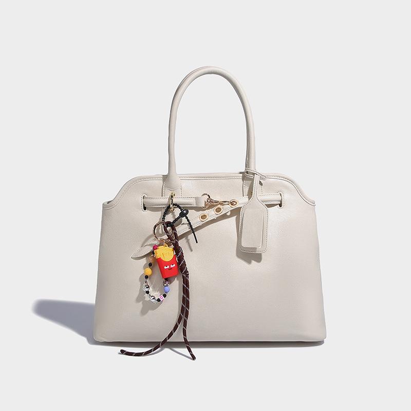 

Niche design senior portable document girl 2024 autumn and winter new commuter large-capacity fashion shoulder bag білий