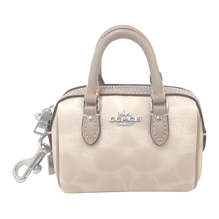 New COACH Coated Canvas Keychain Bag Accessory Trumpets Women's Sand CX068-SVPWH