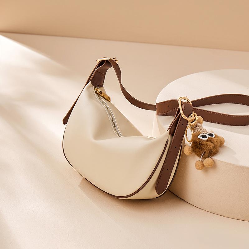 

Женская сумка кроссбоди в стиле Майяр из коровьей кожи в форме пельменя - Модная весенне-летняя сумка на плечо 2025