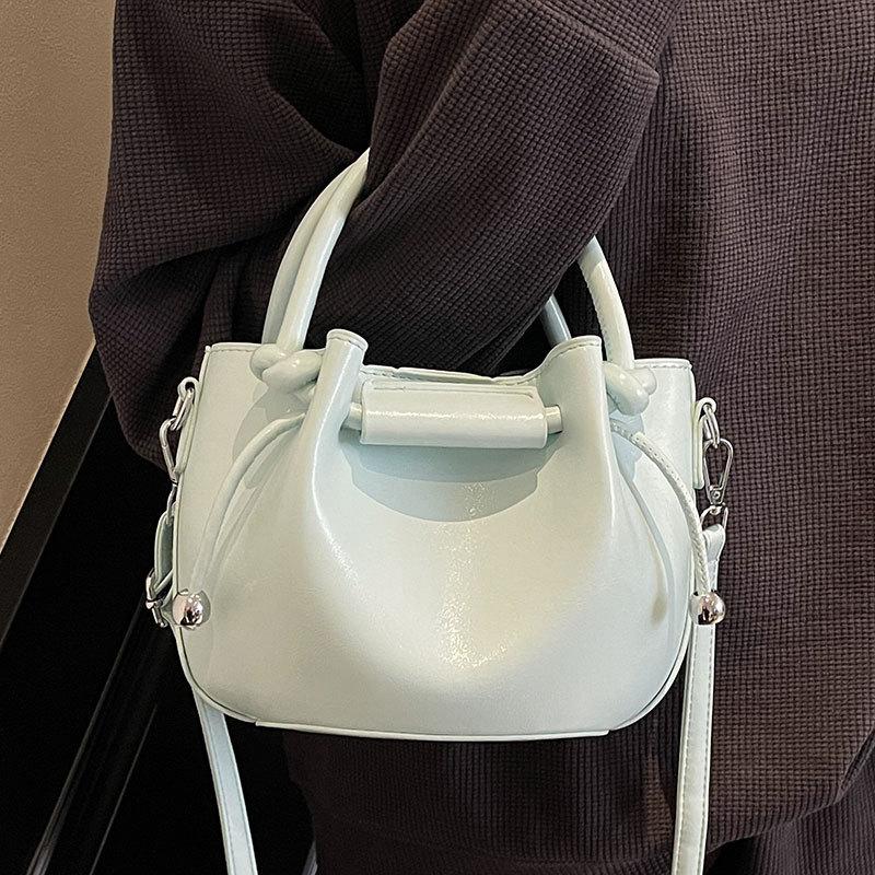 Popular Hot-selling Korean Version of Simple Pleated Small Fresh Portable Bucket Bag Oil Wax Leather Texture Commuter Messenger Women's Bag