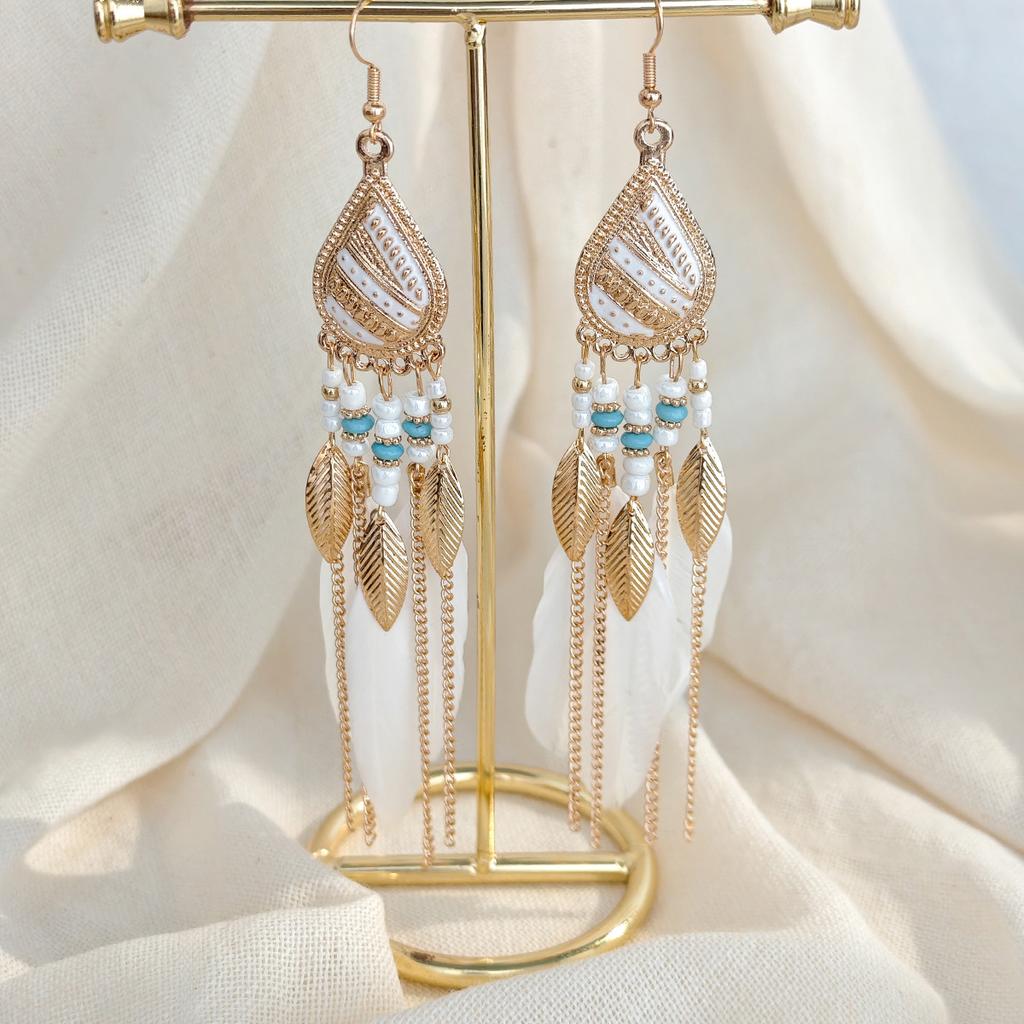 Retro ethnic style woven feathers long fringed earrings, bohemian high-end hollow rice bead earrings