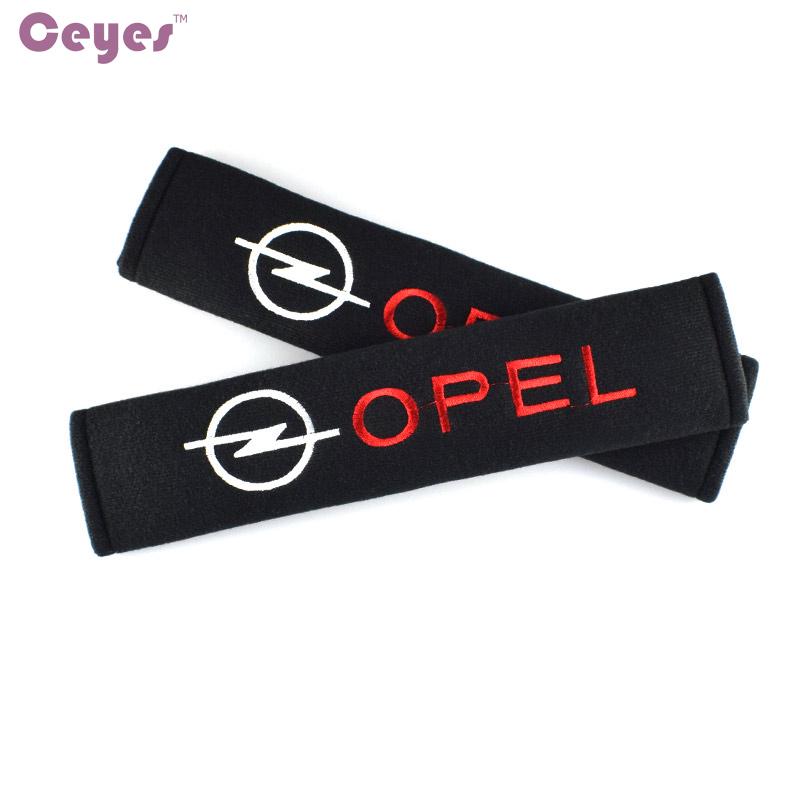 

Ceyes 2pcs Хлопок Seat Belt Pads охватывает эмблемы для Opel Astra H G Insignia Mokka Opc Аксессуары