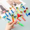 Silbatos de dragón para fiestas infantiles: divertidos accesorios para celebraciones de cumpleaños.