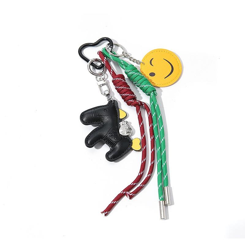 Кожаный брелок в виде смайлика, двухсторонний кулон для школьного рюкзака, маленький кулон, высококлассный креативный изысканный кожаный брелок для ключей от машины