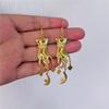 Victoria Gesture Star, Moon, and Sun Charm Earrings