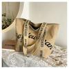 Large-capacity commuter tote bag, new letter shoulder strap, portable shoulder bag.