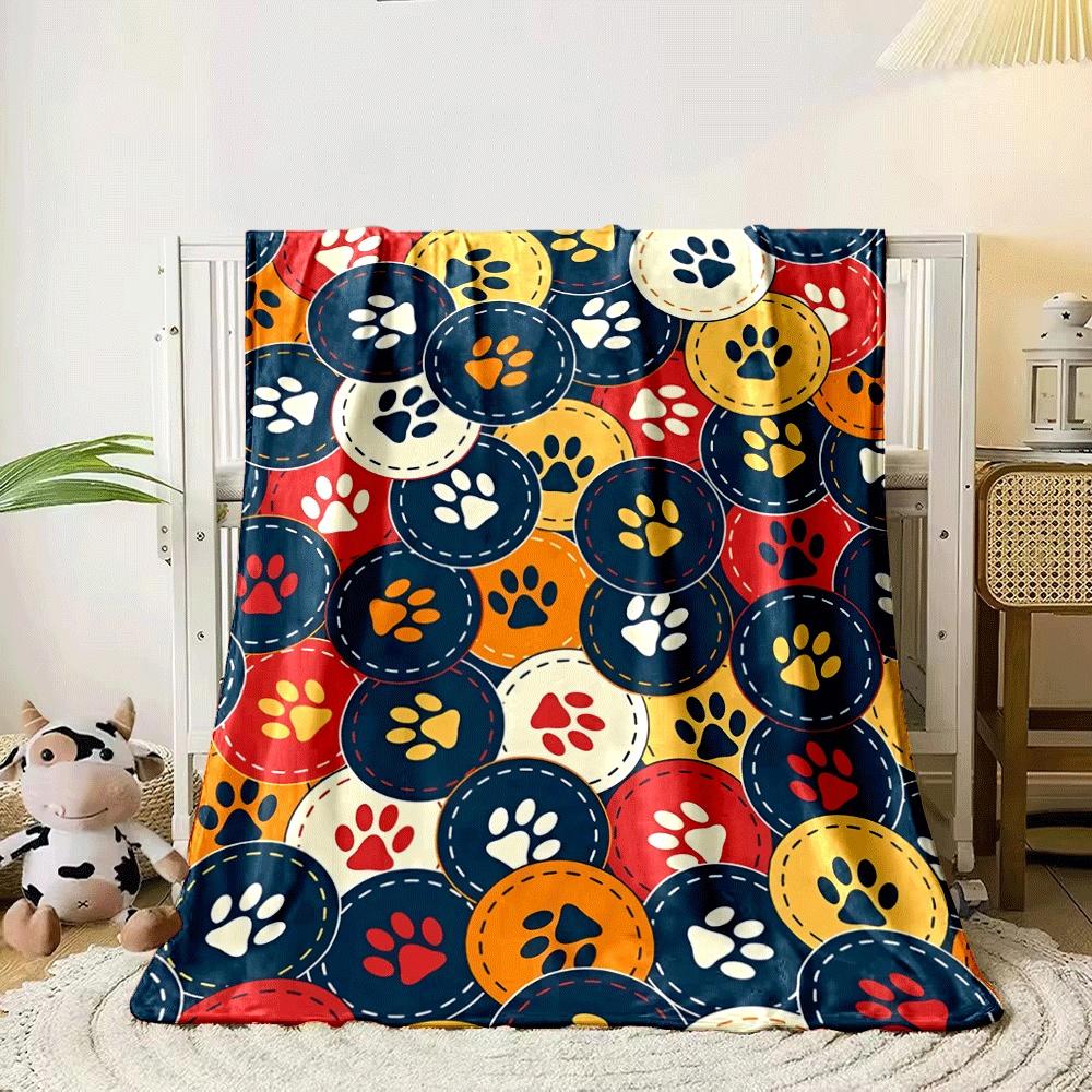 Colorful paw prints in stitched circular patches arranged randomly. for all seasons blanket lunch break throw gift 80cm x 120cm