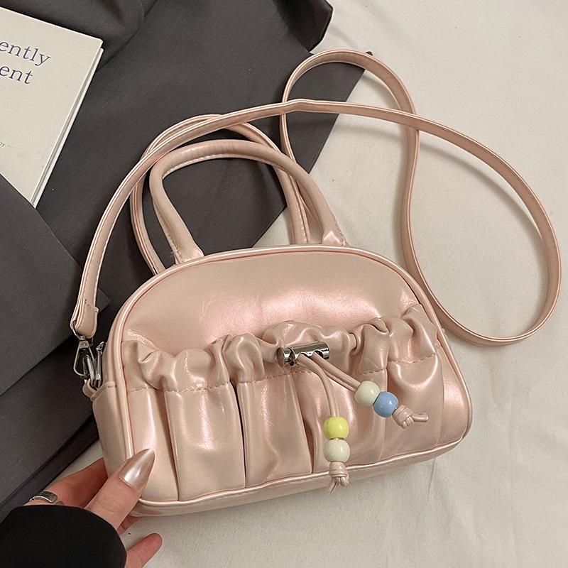 

Корейская версия новой модной нишевой плиссированной сумки-боулинг, женская повседневная темпераментная универсальная сумка через плечо и мессенджер