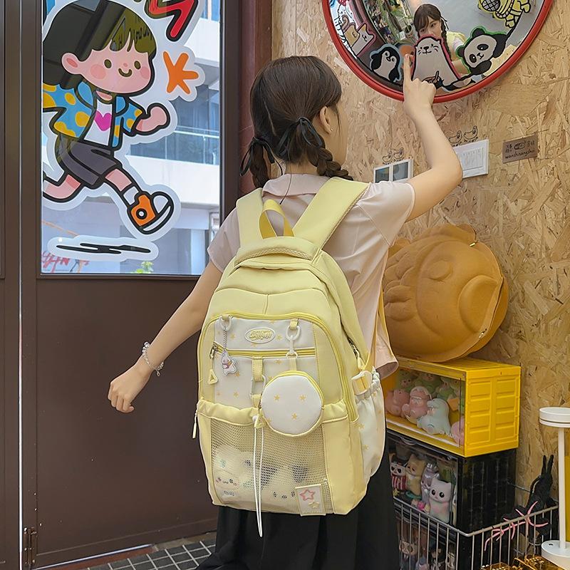 Schoolbag Korean version of the star large-capacity backpack high value junior high school college student schoolbag cute girl transparent pain bag
