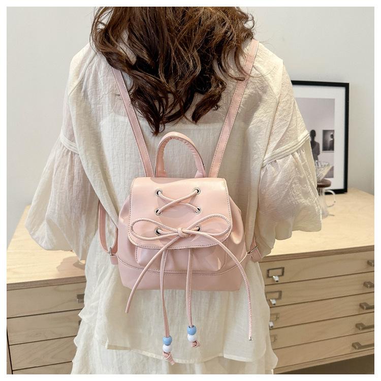 Ballet style bow backpack women 2025 new Internet celebrity portable small backpack go shopping travel small schoolbag