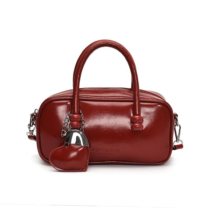 Korean Version of Fashionable Simple Retro Solid Color Portable Boston Bag Casual Versatile Solid Color Commuting Foreign Style Messenger Women's Bag