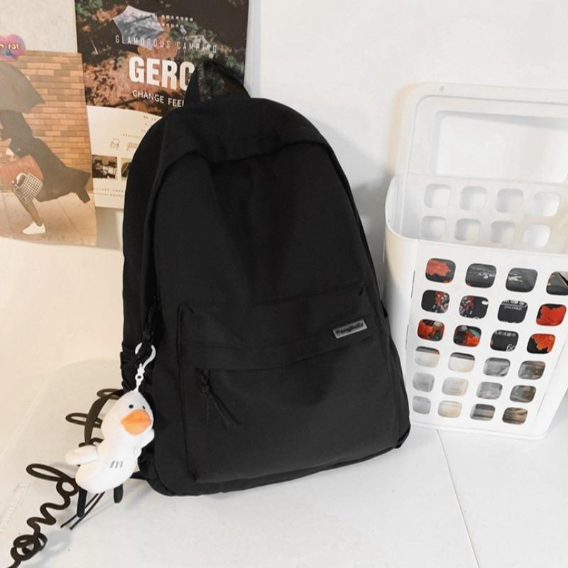 Minimalist School Commuter Backpack with Detachable Duck Plush Keychain Multi Pocket Lightweight Rucksack for Students Travel