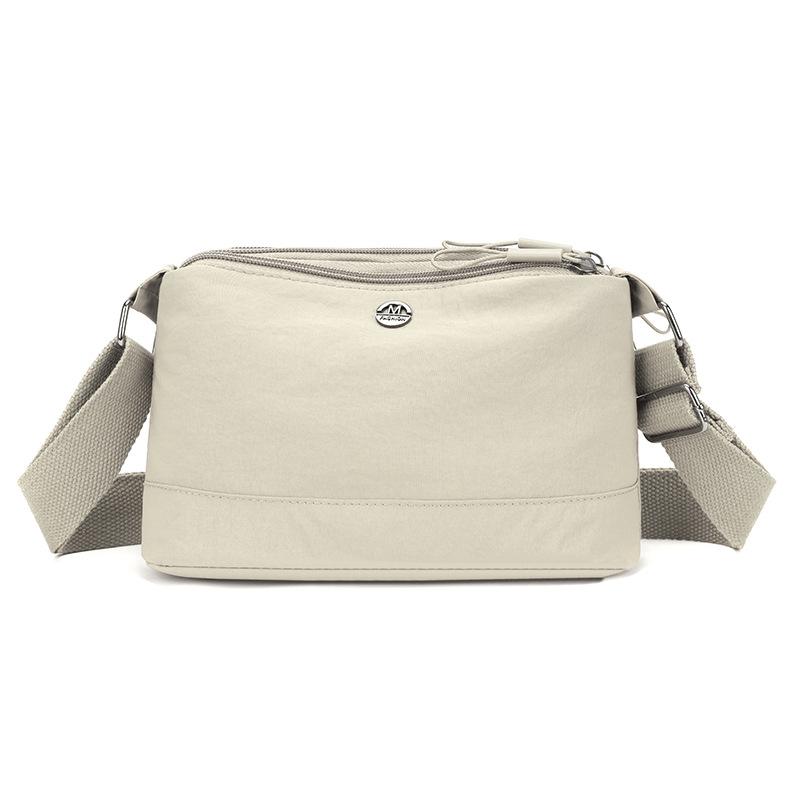 

Простая и Повседневная Нейлоновая Сумка-Мессенджер Женская Новая Легкая Сумка через Плечо Многослойное Хранение Корейский Иностранный Стиль Маленькая Сумка.