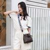 Retro One-shoulder Crossbody Bucket Bag, a New Pumping Belt Casual Women's Bag.
