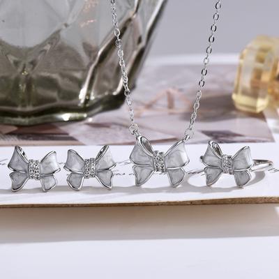 Japanese and Korean Ins Simple Bow Inlaid with Zircon Three-piece Set Ring Stud Earrings Pendant Necklace