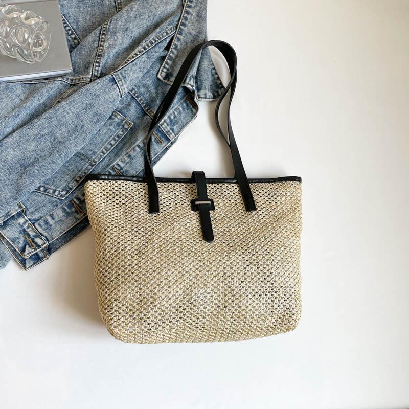 Korean version of the new product niche design Mori hollow straw woven tote bag large capacity casual versatile single shoulder mother and child bag w