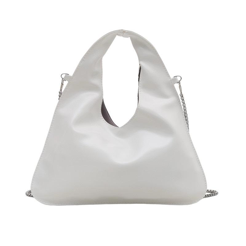 

Нишевая треугольная сумочка женская 2025 лето новая, высокая ценность, сумка-пельмень, модная наплечная сумка-мессенджер, тренд белый