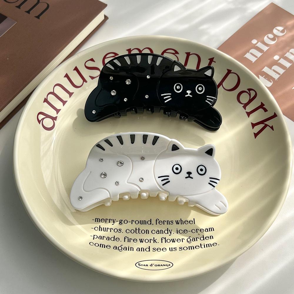 1 Stück Neue schwarze und weiße Katze Kratzspange, niedliche Katze mit großen Augen, Punkt-Diamant hoher Pferdeschwanz Haarspange, Tierhaarspange, Haiklammer