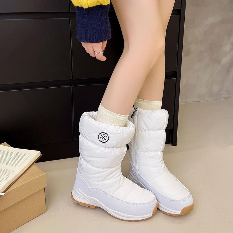 Foreign trade winter new snow boots women's warm cotton shoes women's thickened soles velvet high tube Northeast large cotton boots cold-proof shoes