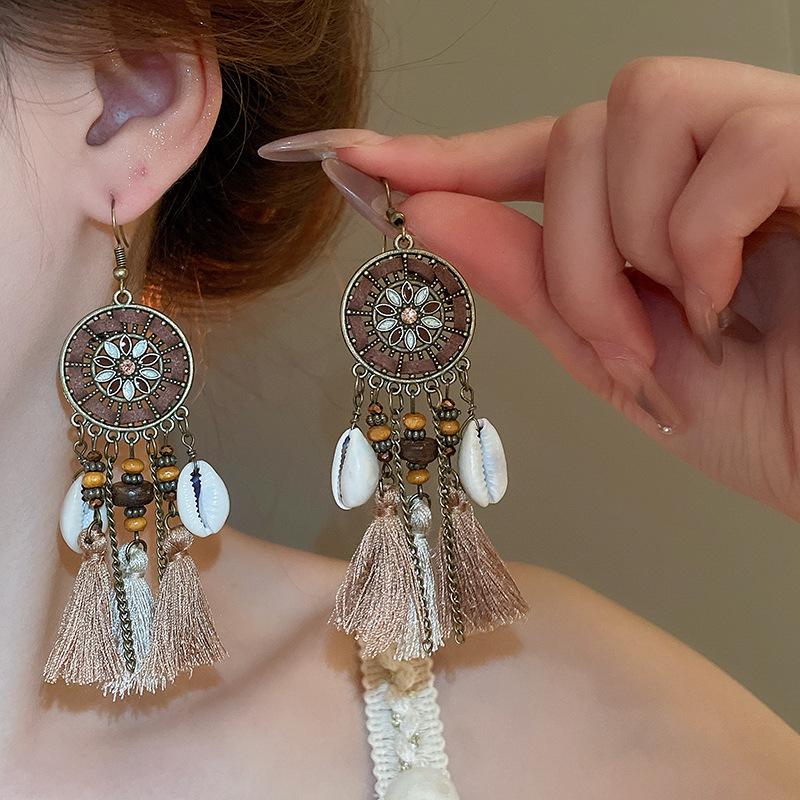 Retro Ethnic Bell Tassel Earrings: Exquisite, Fashionable Dangle Design with Light Luxury Appeal.