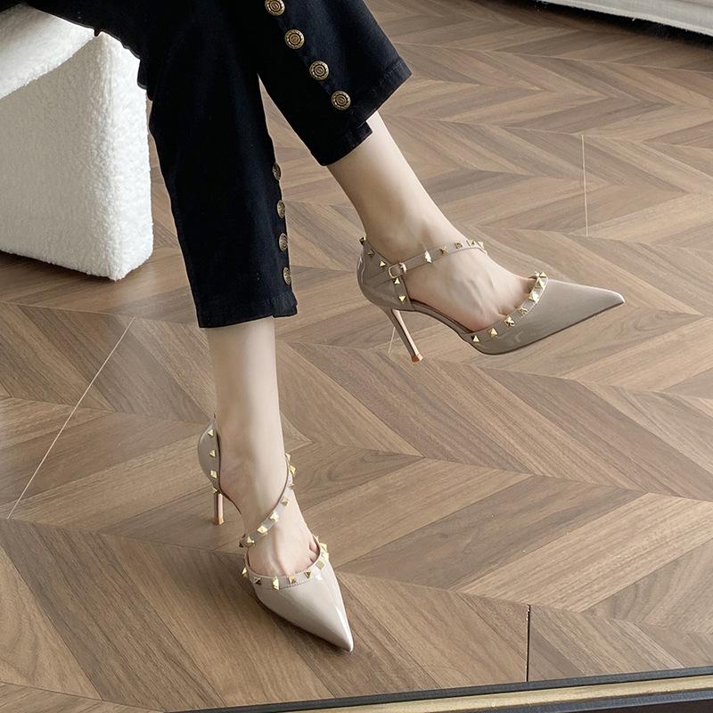 One-word women's rivet sandals 2025 summer new fashionable and sexy European and American light-mouth thin-heeled bright leather high-heeled shoes