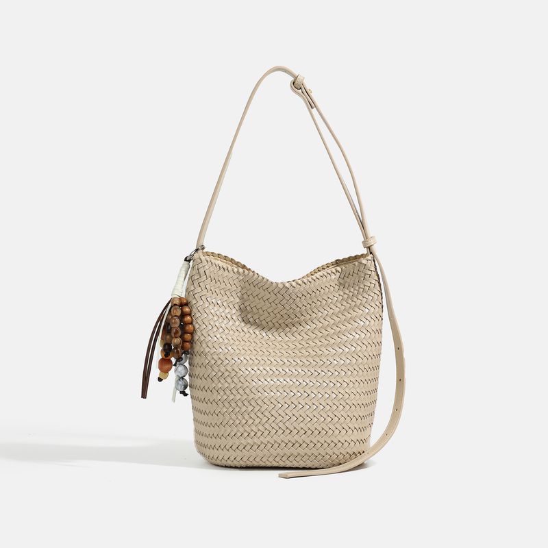 

Cowhide Hand-Woven Bag Women s 2025 Summer New Arrival Large-Capacity Bucket Bag Casual Holiday Shoulder Messenger Bag White