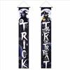 Halloween flags decorate the courtyard for an outdoor party. Cartoon doors hang with festive backdrop cloth. Halloween couplets.