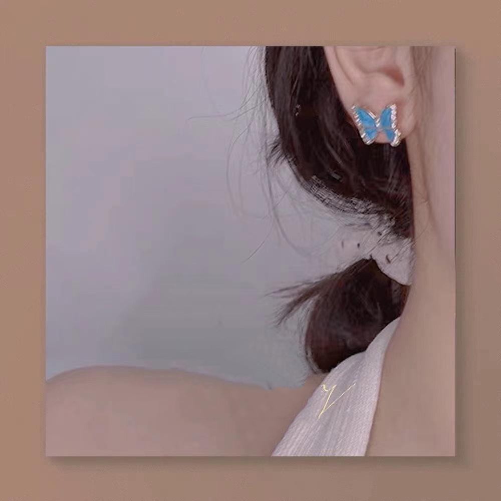 2023 Trendy Blue Butterfly Skin-Brightening Shimmer Earrings: Enhance Your Summer Style
