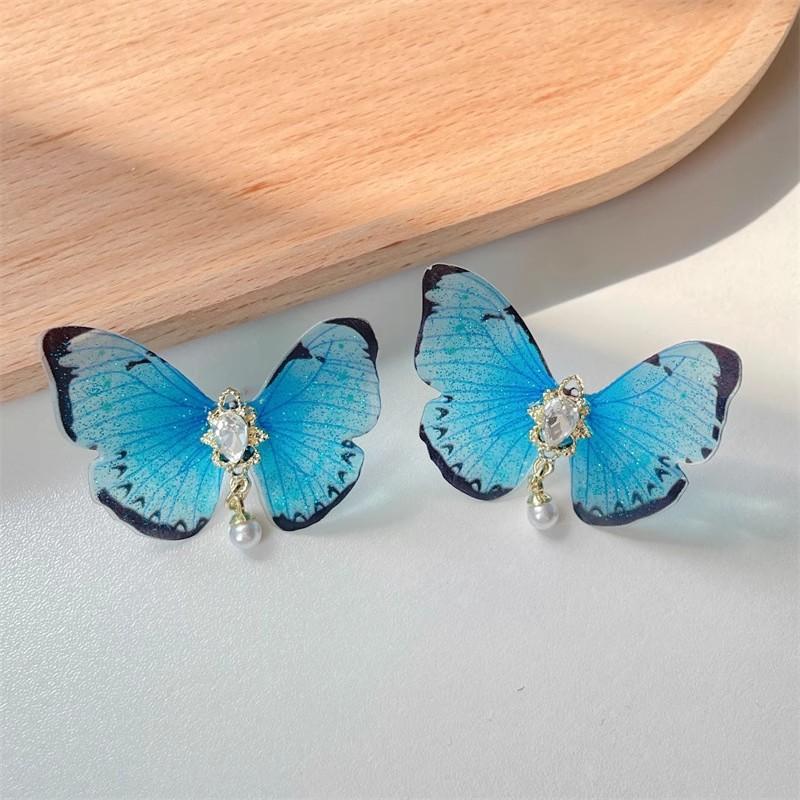 

Жіночі геометричні сережки з розкішним темпераментом у стилі ретро, ​​синьо-фіолетовими з метеликами синій