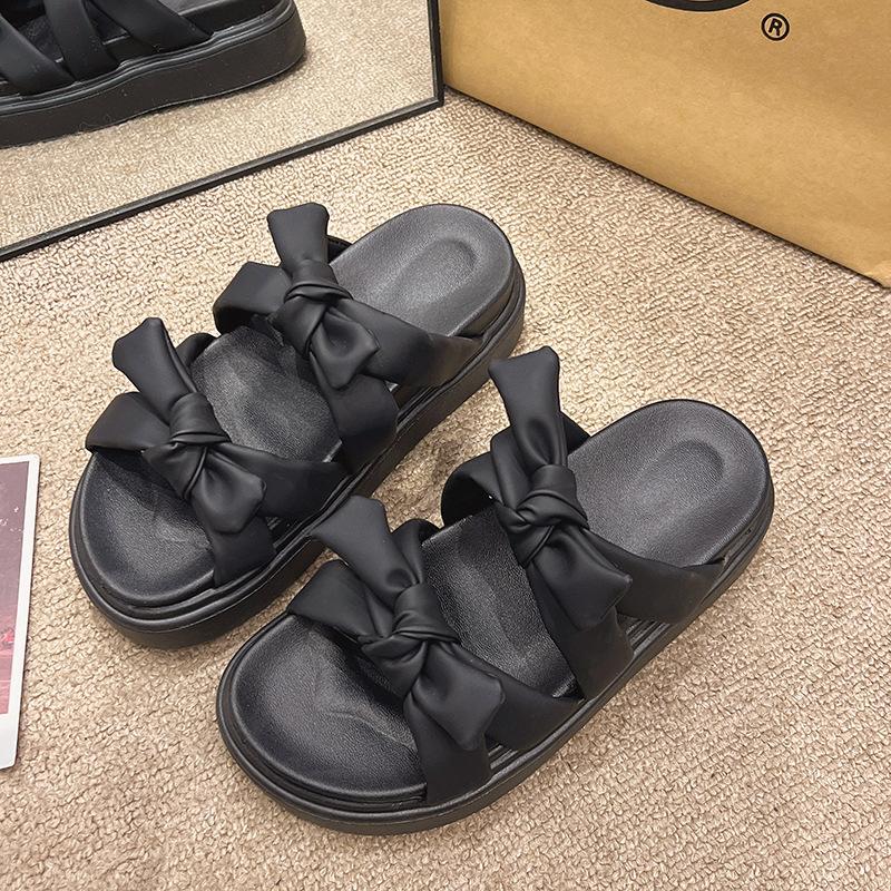 Bow-tie one-word cool slippers women's 2025 summer new Korean version of cute students thick-soled open-toed women's slippers