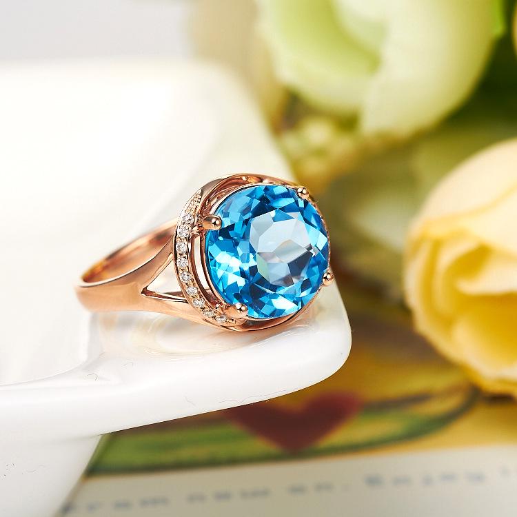 Adjustable Swiss Blue Topaz Ring in 18K Rose Gold Plating - Women's Engagement Jewelry