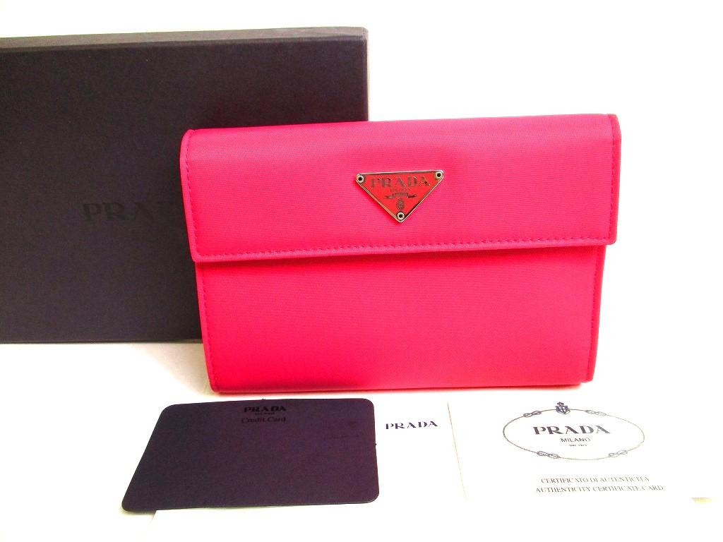 

Автентичний портмоне-гаманець PRADA Peonia Pink Nylon Black Leather Gamand №9592 Refurbished