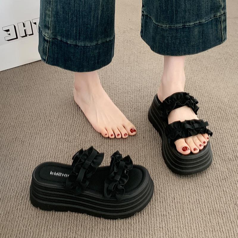 Thick-soled one-word slippers women's 2025 summer new pleated lace high-end wedge heel European goods show high outer sandals