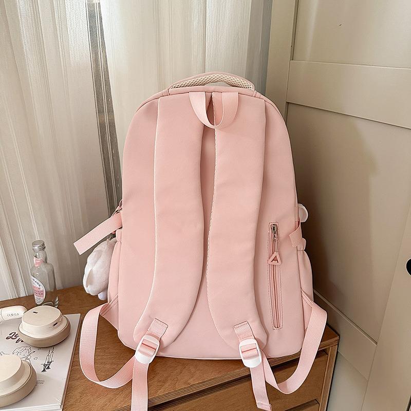 The new schoolbag is high-value, fresh and sweet, candy-colored backpack, contrasting color splicing, and lightweight travel backpack.