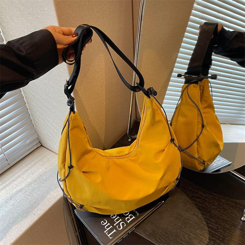 2026 Women's Versatile Casual College Crescent Dumpling Crossbody Bag