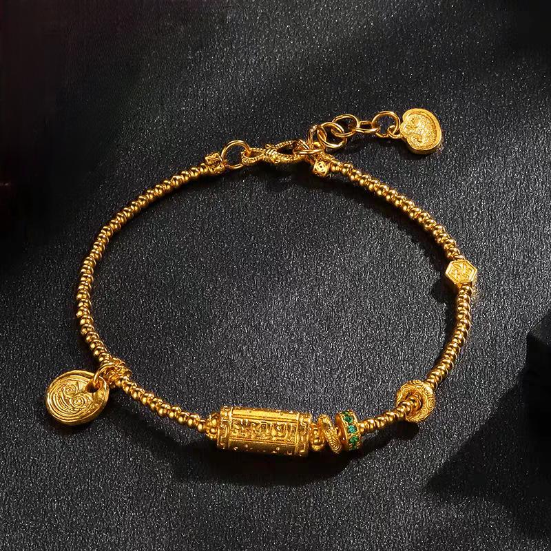 Lucky Goddess Gold-Color Ethnic Bracelet with Engraved Barrel Beads and Tibetan Rope.