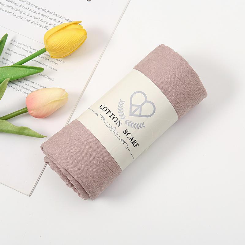 Autumn and winter new micro-elastic crumpled cotton blended long towel right angle lock edge polyester headscarf hot-selling solid color scarf