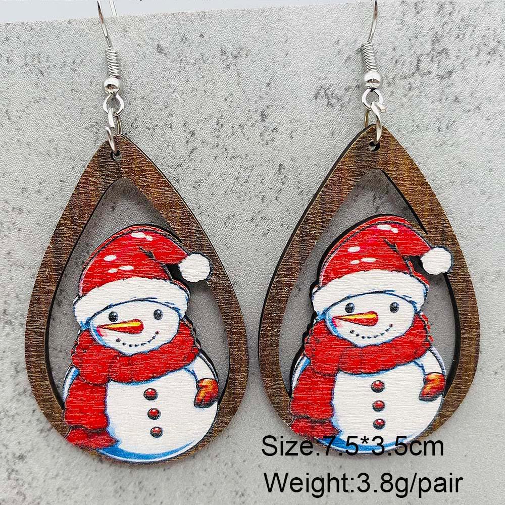 

Festive Wooden Earrings: Gingerbread Man, Christmas Tree, Santa Claus, Snowman Prints Wood