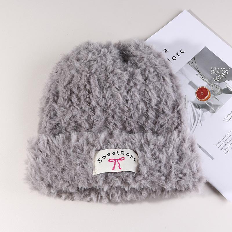 Women's Warm Autumn and Winter Knitted Hat Bow Korean Warm Plush Ear Protection Head Hat