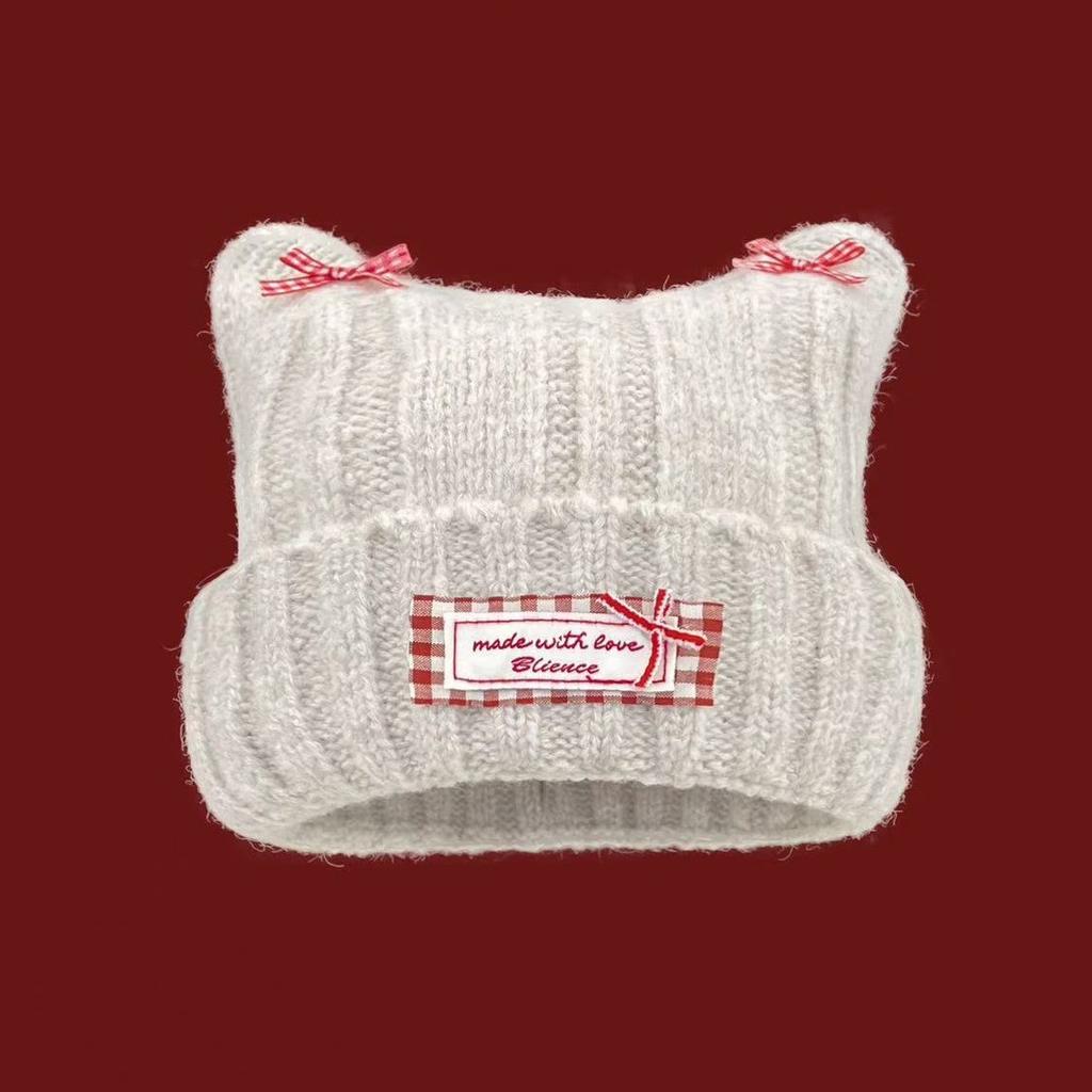 Sweet bow cat ear knitted pullover hat for women, small face in autumn and winter, warm and fashionable versatile wool hat