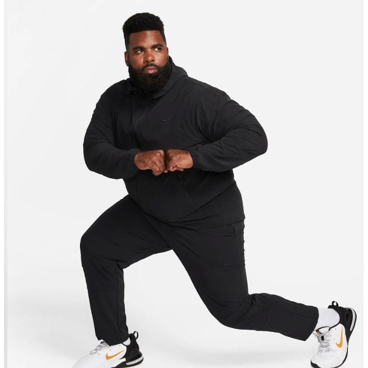 Nike Nieograniczone Spodnie dresowe Comfort Knit z haftowanym logo Męskie Spodnie Czarne FB7546-010
