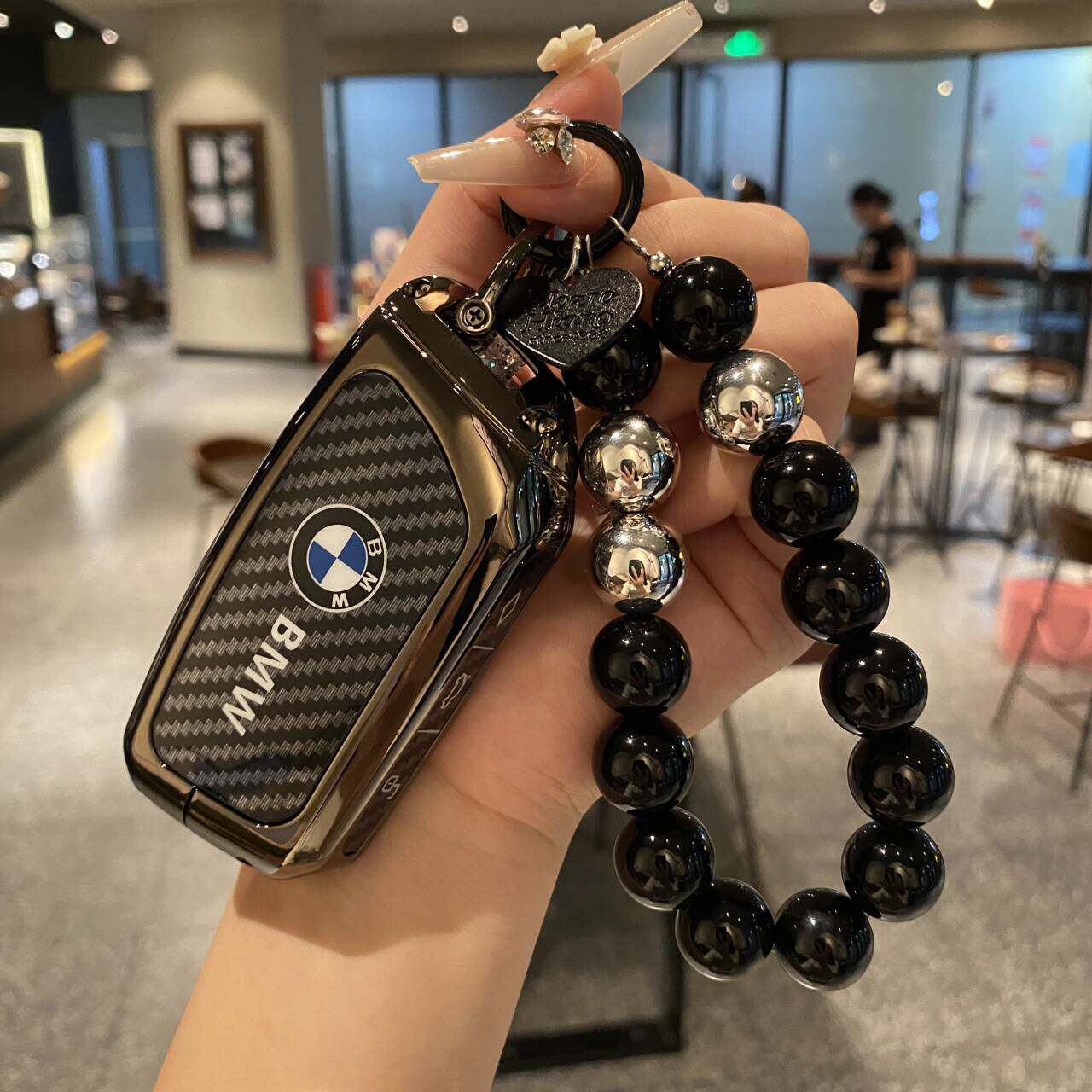 

Suitable for BMW 24 new 5 Series keycases x1x5x6x7 shell 7 Series package i5/i7 carbon fiber xm/ix buckle for men and women