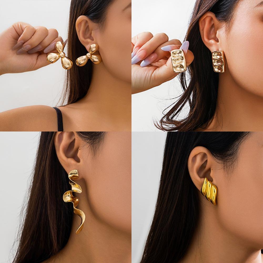 

Простота серьги-крылья, серьги темперамента, новые спиральные серьги с цветком