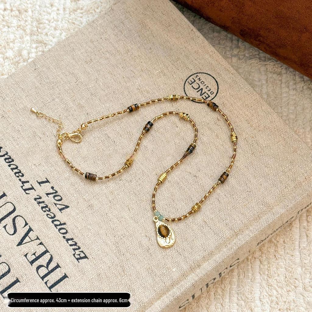 Retro Tiger Eye Stone Necklace - Versatile Maillard Style for Autumn & Winter Sweaters, High-End Luxury Accessory.