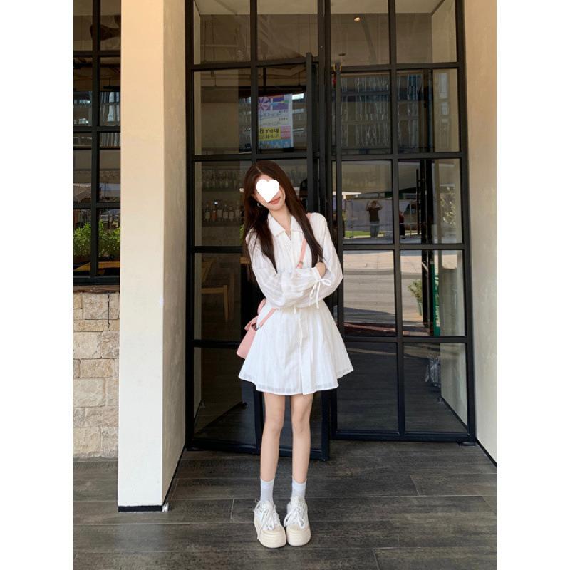 White small lapel long-sleeved dress women's spring dress new design sense lace-up and thin waist A-word short skirt