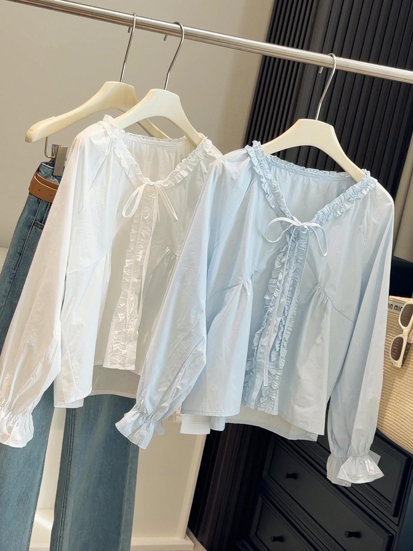 

Korean Style Age-Defying Ruffled Patchwork Tie-Up V-Neck Lantern Sleeve Top One Size синий