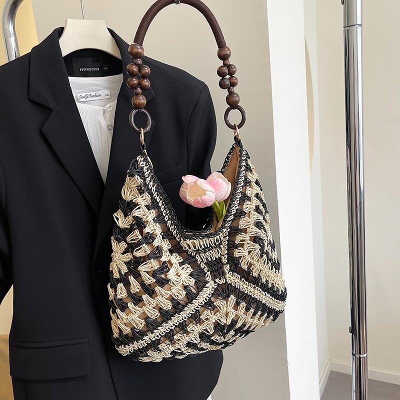 Summer fashion bag women 2025 new seaside beach hollow shoulder bag portable woven tote bag