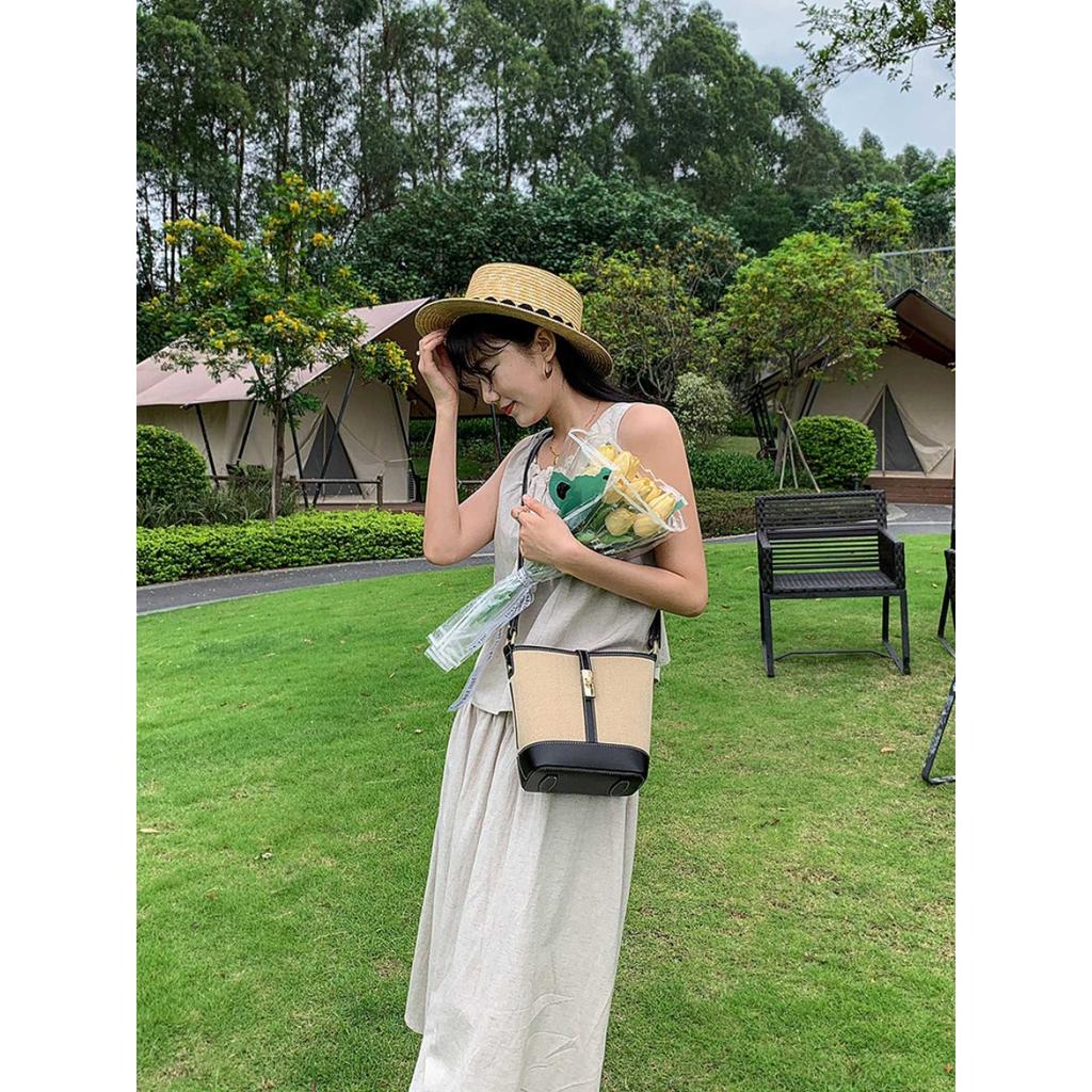 Cowhide canvas splicing bucket bag women's 2025 summer shoulder oblique span bag casual versatile underarm bag Korean version tide